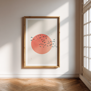 Sole rosso e volo d'uccelli